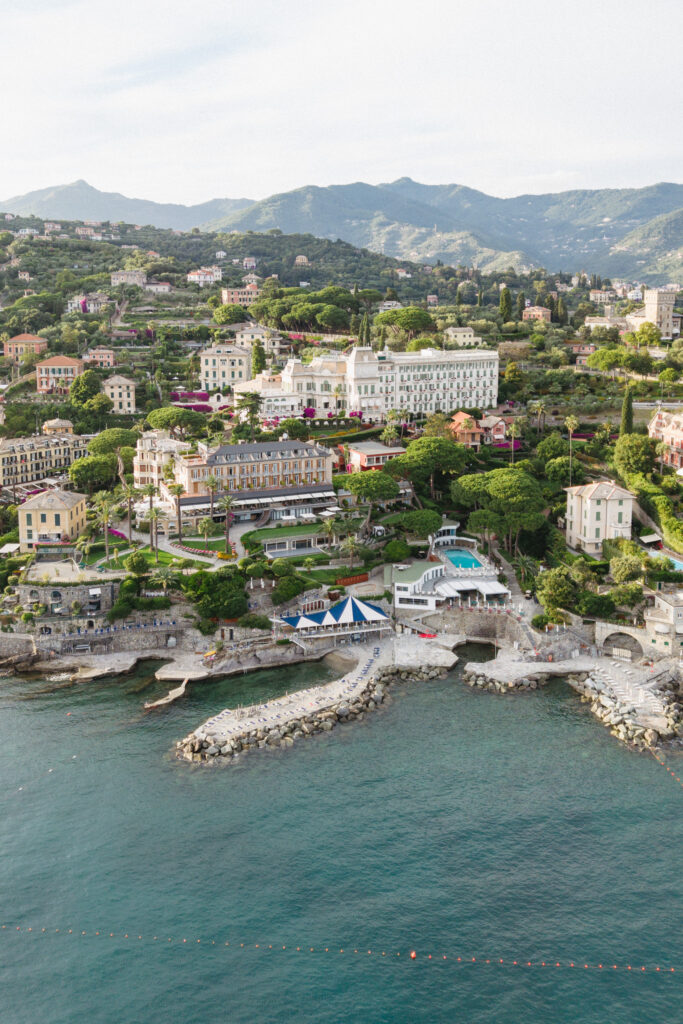 Aerial view of Imperiale Palace Hotel, a Santa Margherita Ligure wedding venue, with turquoise sea and hillside villas